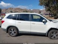 2016 Honda Pilot — photo 13 of 16 | VIN 5FNYF5H39GB031272