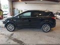 2018 Ford Escape — photo 14 of 16 | VIN 1FMCU9J99JUB31100