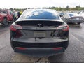 2024 Tesla Model Y — photo 16 of 21 | VIN 7SAYGAEE8RF981950