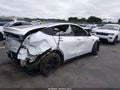 2026 Tesla Model Y — photo 4 of 15 | VIN 7SAYGDED9TA675465