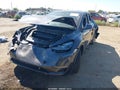 2024 Tesla Model Y — photo 2 of 15 | VIN 7SAYGDED7RF115231