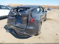 2024 Tesla Model Y — photo 4 of 15 | VIN 7SAYGDED7RF115231