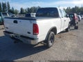 2000 Ford F-150 — photo 4 of 16 | VIN 1FTRX18W4YNB80812