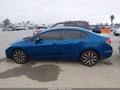 2015 Honda Civic — photo 14 of 16 | VIN 2HGFB2F97FH527352