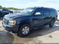 2011 Chevrolet Suburban 1500 — photo 2 of 16 | VIN 1GNSKJE3XBR397363