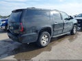 2011 Chevrolet Suburban 1500 — photo 4 of 16 | VIN 1GNSKJE3XBR397363