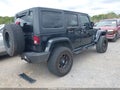 2015 Jeep Wrangler Unlimited — photo 4 of 18 | VIN 1C4BJWDG1FL560830