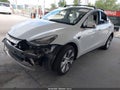 2021 Tesla Model Y — photo 2 of 15 | VIN 5YJYGDEE8MF069424