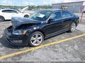 2015 Volkswagen Passat — photo 2 of 15 | VIN 1VWCV7A35FC041664