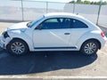 2013 Volkswagen Beetle — photo 13 of 17 | VIN 3VWFP7AT0DM625747
