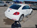2013 Volkswagen Beetle — photo 4 of 17 | VIN 3VWFP7AT0DM625747