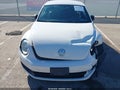 2013 Volkswagen Beetle — photo 6 of 17 | VIN 3VWFP7AT0DM625747