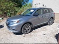 2016 Mitsubishi Outlander — photo 2 of 16 | VIN JA4AD2A35GZ030639