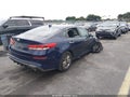 2019 Kia Optima — photo 4 of 16 | VIN 5XXGT4L30KG337742