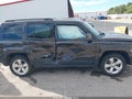 2014 Jeep Patriot — photo 13 of 16 | VIN 1C4NJPFB1ED864575
