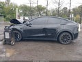 2024 Tesla Model Y — photo 12 of 14 | VIN 7SAYGDEE5RA218332