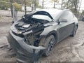 2024 Tesla Model Y — photo 2 of 14 | VIN 7SAYGDEE5RA218332
