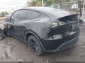 2024 Tesla Model Y — photo 3 of 14 | VIN 7SAYGDEE5RA218332