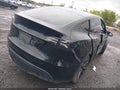 2024 Tesla Model Y — photo 4 of 14 | VIN 7SAYGDEE5RA218332