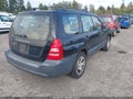 2005 Subaru Forester — photo 4 of 14 | VIN JF1SG636X5H726664