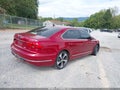 2016 Volkswagen Passat — photo 4 of 17 | VIN 1VWBS7A31GC059438