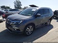 2018 Honda Pilot — photo 2 of 19 | VIN 5FNYF5H92JB004197
