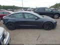 2024 Tesla Model 3 — photo 14 of 21 | VIN 5YJ3E1ET1RF858289