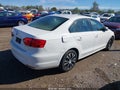 2013 Volkswagen Jetta — photo 4 of 11 | VIN 3VWDX7AJ5DM221056