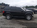 2011 Mazda Tribute — photo 14 of 17 | VIN 4F2CY0C72BKM02916