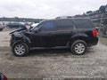 2011 Mazda Tribute — photo 15 of 17 | VIN 4F2CY0C72BKM02916