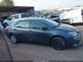 2016 Toyota Corolla — photo 13 of 16 | VIN 5YFBURHE1GP551197