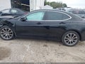 2015 Acura TLX — photo 14 of 16 | VIN 19UUB1F51FA010593