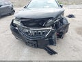 2015 Acura TLX — photo 6 of 16 | VIN 19UUB1F51FA010593