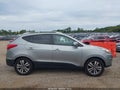 2014 Hyundai Tucson — photo 13 of 16 | VIN KM8JU3AG2EU915014