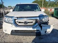 2011 Honda Pilot — photo 12 of 16 | VIN 5FNYF3H97BB039596