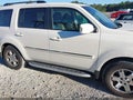 2011 Honda Pilot — photo 13 of 16 | VIN 5FNYF3H97BB039596
