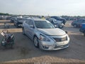 2015 Nissan Altima — photo 1 of 16 | VIN 1N4AL3AP0FC113677