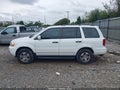 2004 Honda Pilot — photo 15 of 17 | VIN 2HKYF18684H550264