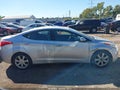 2013 Hyundai Elantra — photo 13 of 16 | VIN KMHDH4AE4DU918422