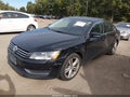 2014 Volkswagen Passat — photo 2 of 11 | VIN 1VWBT7A32EC035112