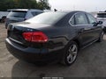 2014 Volkswagen Passat — photo 4 of 11 | VIN 1VWBT7A32EC035112