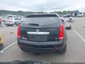 2014 Cadillac SRX — photo 16 of 16 | VIN 3GYFNCE37ES665374