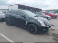 2014 Cadillac SRX — photo 1 of 16 | VIN 3GYFNCE37ES665374