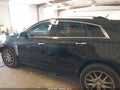 2013 Cadillac SRX — photo 14 of 16 | VIN 3GYFNJE35DS650309