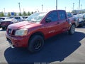 2007 Nissan Titan — photo 2 of 13 | VIN 1N6AA07A97N246314