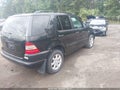 2000 Mercedes-Benz M-Class — photo 4 of 11 | VIN 4JGAB72E0YA209496
