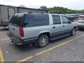 1997 GMC Suburban — photo 4 of 14 | VIN 1GKEC16R4VJ760799