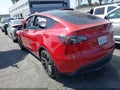 2023 Tesla Model Y — photo 3 of 24 | VIN 7SAYGDEF8PF648199