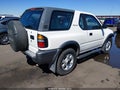 1999 Isuzu Amigo — photo 4 of 16 | VIN 4S2CK57W0X4352128