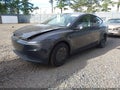 2026 Tesla Model Y — photo 2 of 21 | VIN 7SAYGDEDXTA592336